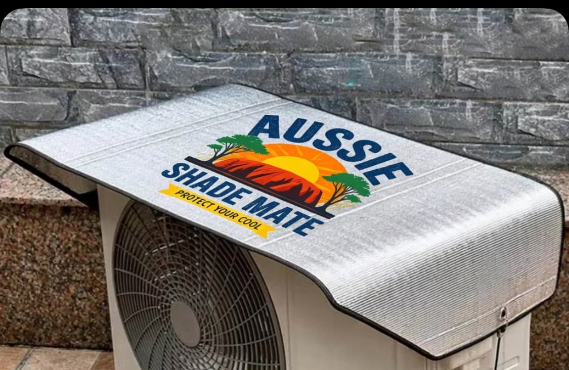 Top view of the reflective ShadeMate cover on a split-system outdoor unit